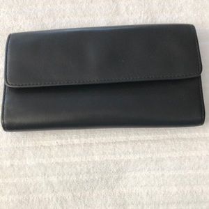 Brooks tone leather clutch